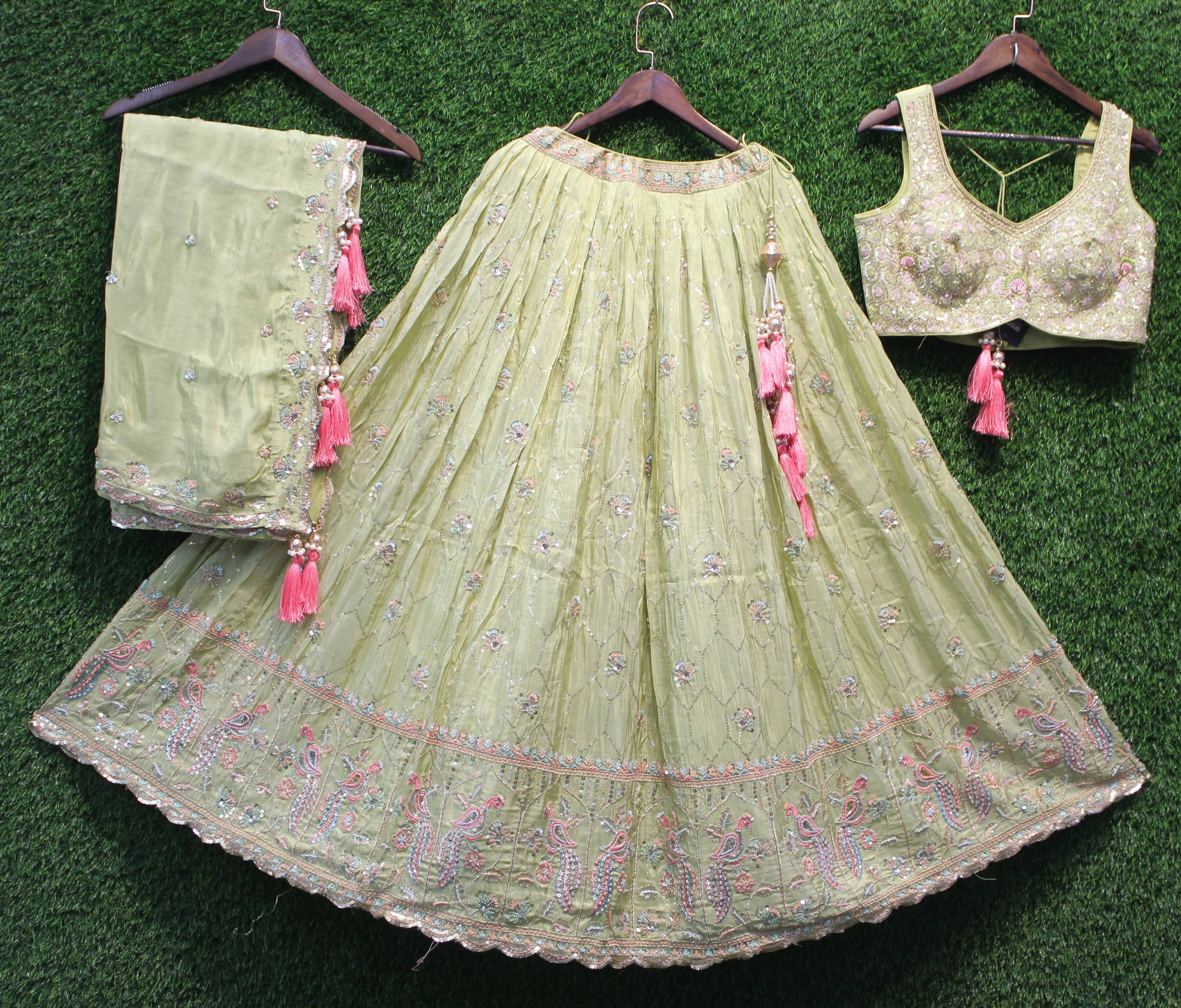 Pastel Green Thread & Sequin Embroidered Lehenga Choli with Pink Tassels