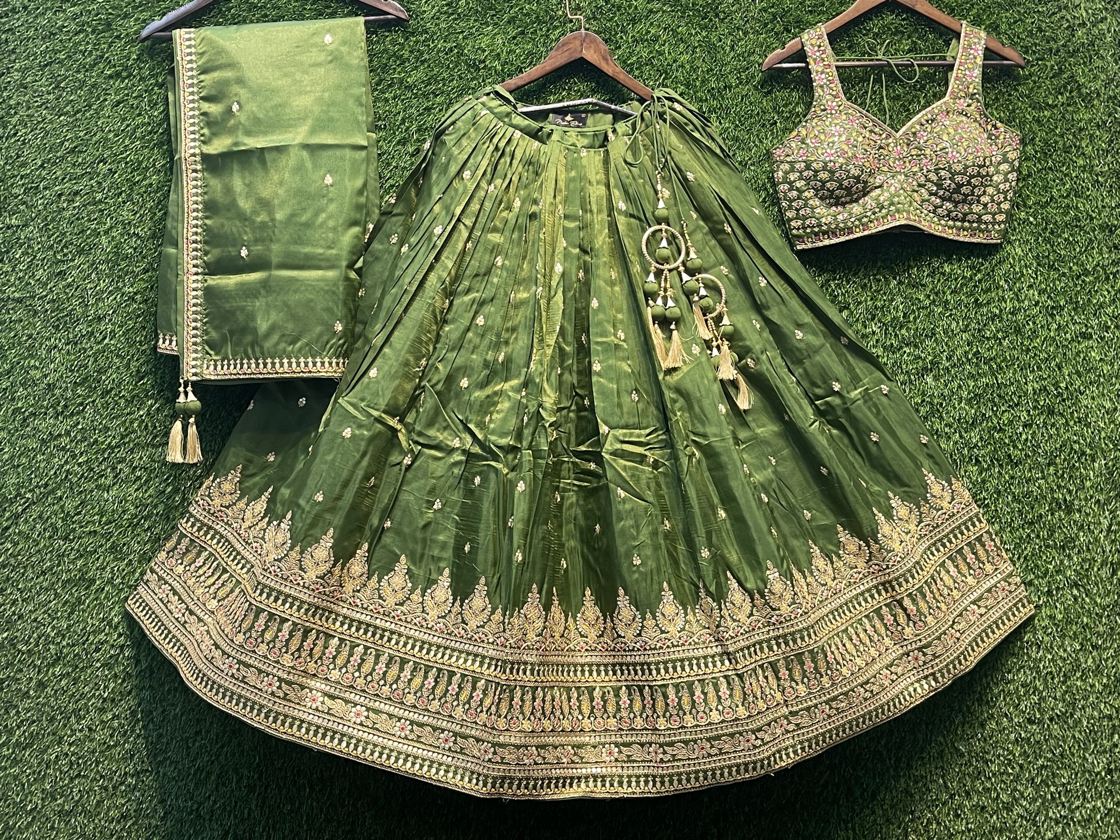 Elegant Green Heavy Embroidered Lehenga Choli