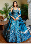 Teal blue designer Chaniya Choli with silver handwork and dupatta