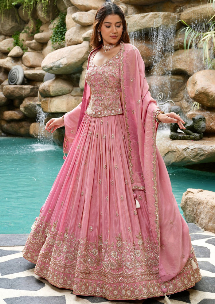Blush pink designer Chaniya Choli with heavy embroidery and dupatta