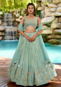 Sea green designer Chaniya Choli with heavy embroidery and dupatta