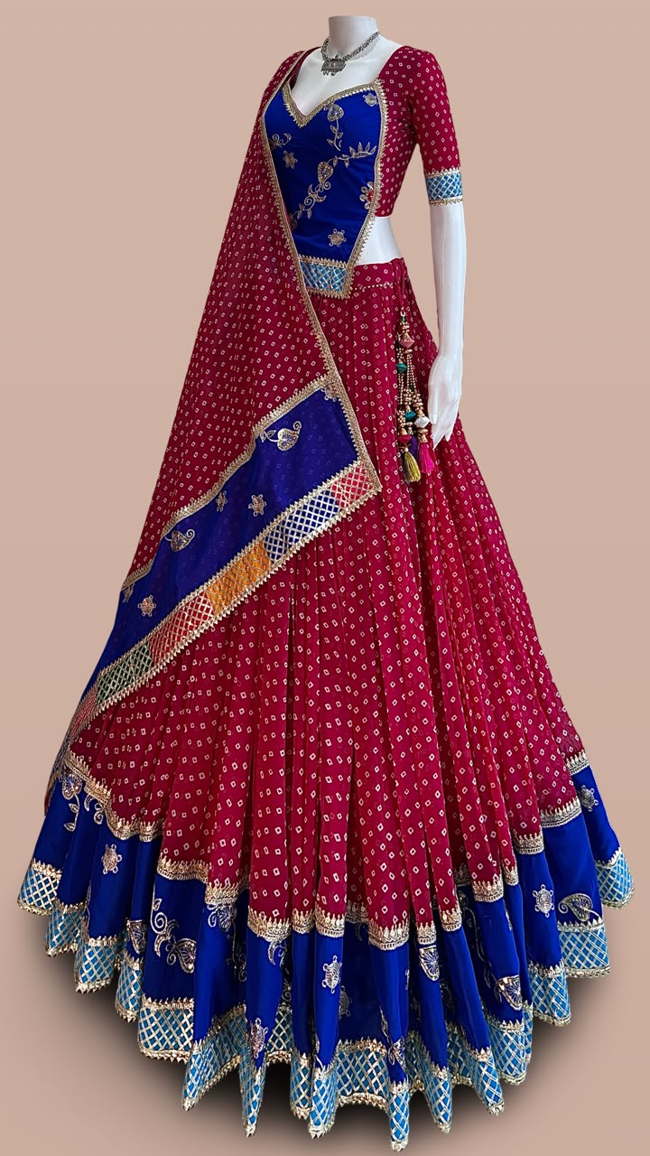 Red and blue designer Bandhani Chaniya Choli with embroidered dupatta for Navratri 2026