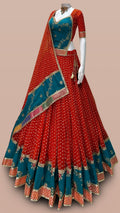 Red and teal designer Bandhani Chaniya Choli with embroidered dupatta for Navratri 2026