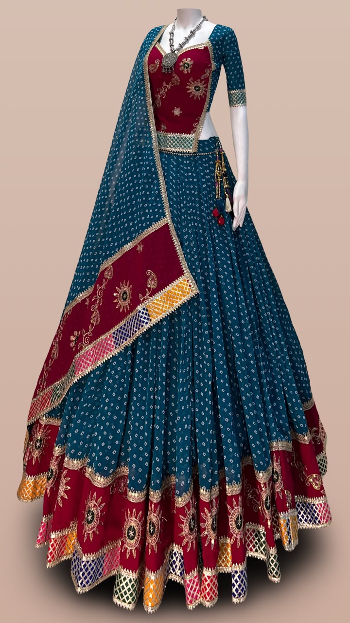 Teal and maroon designer Bandhani Chaniya Choli with embroidered dupatta for Navratri 2026