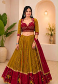 Mustard printed Chaniya Choli with maroon blouse and dupatta for Navratri